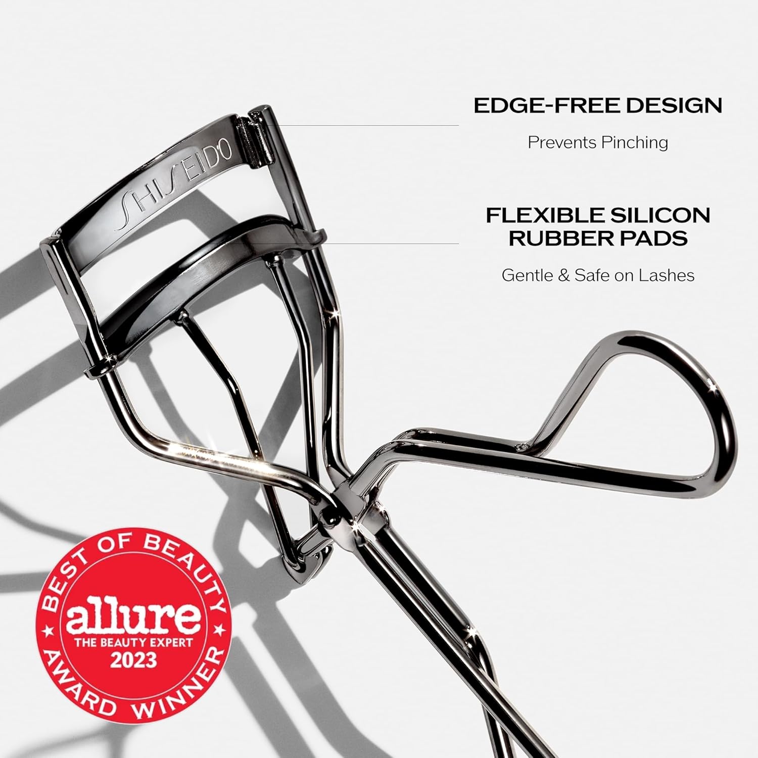 Shiseido Eyelash Curler - Crimps & Curls Lashes for Perfect, Eye-Framing Fringe - Gentle & Safe - Includes ReTLacement Pad